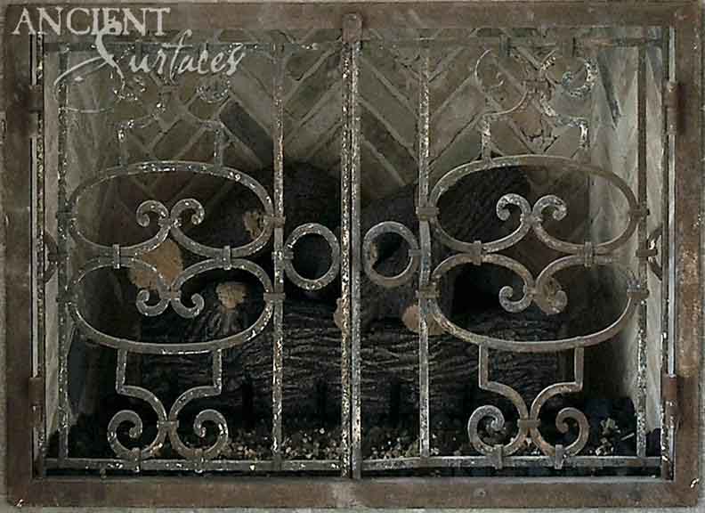 ancient_surfaces_antique_metal_gates_hand_forged_firebacks_historic_ironwork_period_metal_gates_old_world_fireplace_backplates_luxury_architectural_metal_elements_reclaimed_iron_gates_vintage_fireback_design_premium_antique_metalwork_architectural_salvage_iron_features_high_end_metal_gates_and_firebacks_traditional_european_metalcraft