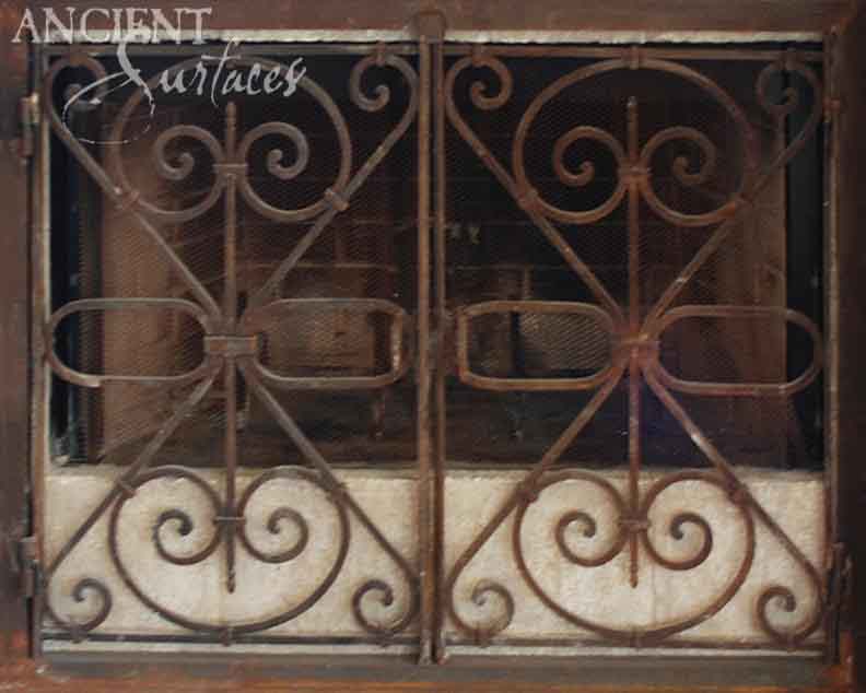 ancient_surfaces_antique_metal_gates_hand_forged_firebacks_historic_ironwork_period_metal_gates_old_world_fireplace_backplates_luxury_architectural_metal_elements_reclaimed_iron_gates_vintage_fireback_design_premium_antique_metalwork_architectural_salvage_iron_features_high_end_metal_gates_and_firebacks_traditional_european_metalcraft