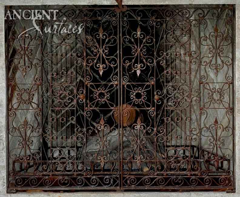 ancient_surfaces_antique_metal_gates_hand_forged_firebacks_historic_ironwork_period_metal_gates_old_world_fireplace_backplates_luxury_architectural_metal_elements_reclaimed_iron_gates_vintage_fireback_design_premium_antique_metalwork_architectural_salvage_iron_features_high_end_metal_gates_and_firebacks_traditional_european_metalcraft
