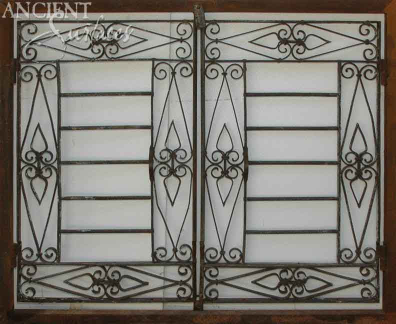 ancient_surfaces_antique_metal_gates_hand_forged_firebacks_historic_ironwork_period_metal_gates_old_world_fireplace_backplates_luxury_architectural_metal_elements_reclaimed_iron_gates_vintage_fireback_design_premium_antique_metalwork_architectural_salvage_iron_features_high_end_metal_gates_and_firebacks_traditional_european_metalcraft
